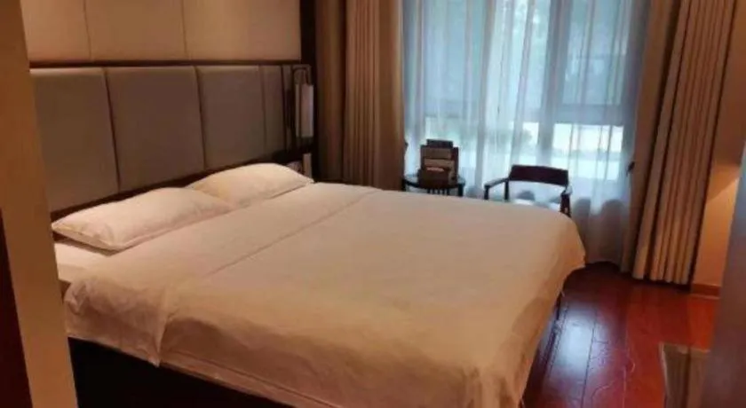 Bed in GreenTree Eastern Hotel Linyi Linshu County Aegean Sea