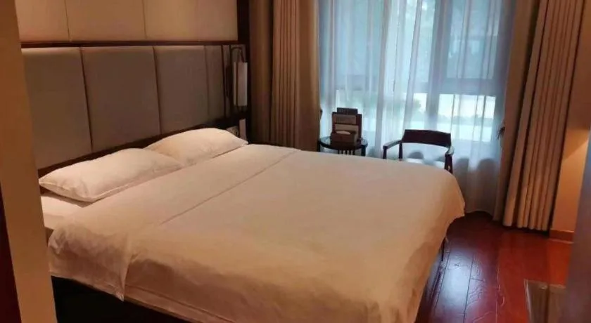 Bed in GreenTree Eastern Hotel Linyi Linshu County Aegean Sea