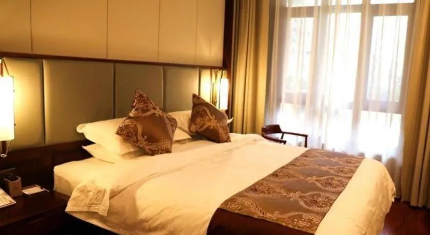 Bed in GreenTree Eastern Hotel Linyi Linshu County Aegean Sea