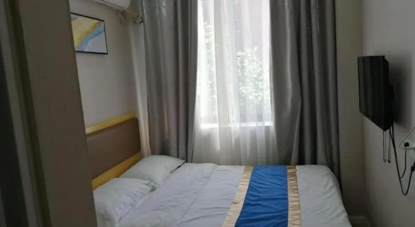 Bed in Shell Hotel Shanghai Normal University Hongcao Road Metro Station Guiping Road