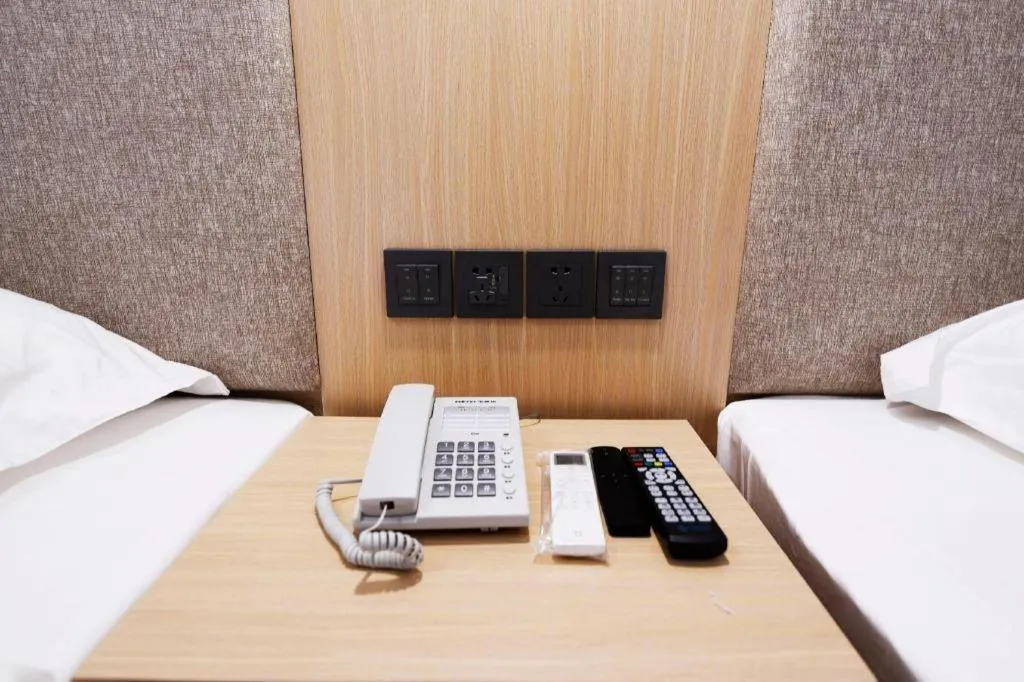 Bed in Shell Hotel Shanghai Normal University Hongcao Road Metro Station Guiping Road