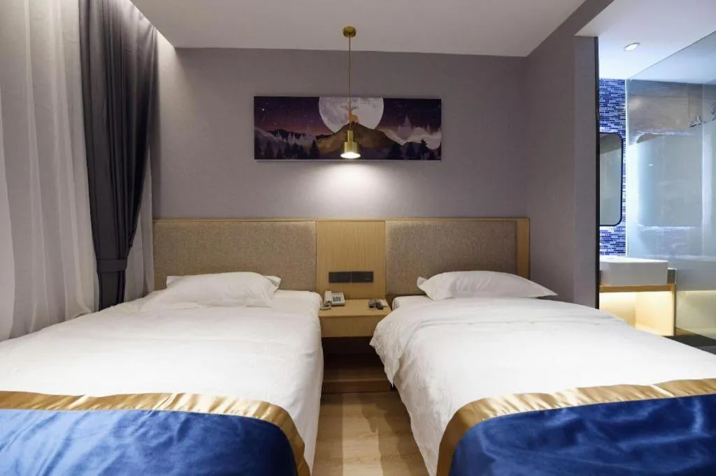Bed in Shell Hotel Shanghai Normal University Hongcao Road Metro Station Guiping Road