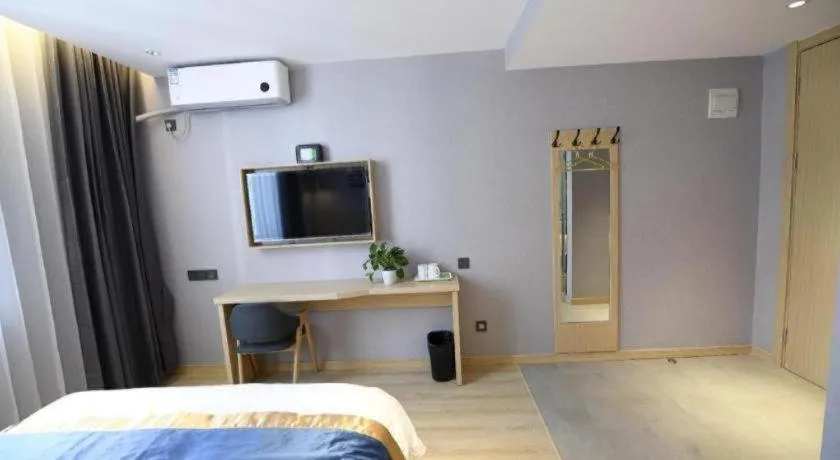 Bed in Shell Hotel Shanghai Normal University Hongcao Road Metro Station Guiping Road