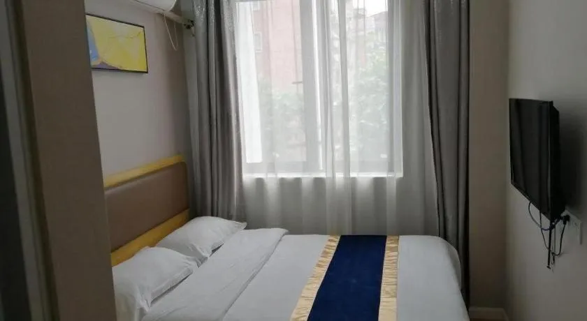 Bed in Shell Hotel Shanghai Normal University Hongcao Road Metro Station Guiping Road