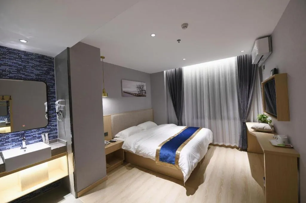 Bed in Shell Hotel Shanghai Normal University Hongcao Road Metro Station Guiping Road