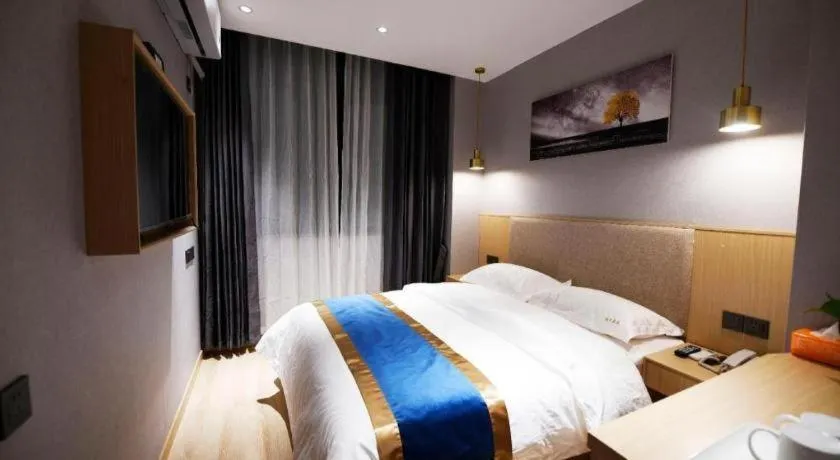 Bed in Shell Hotel Shanghai Normal University Hongcao Road Metro Station Guiping Road