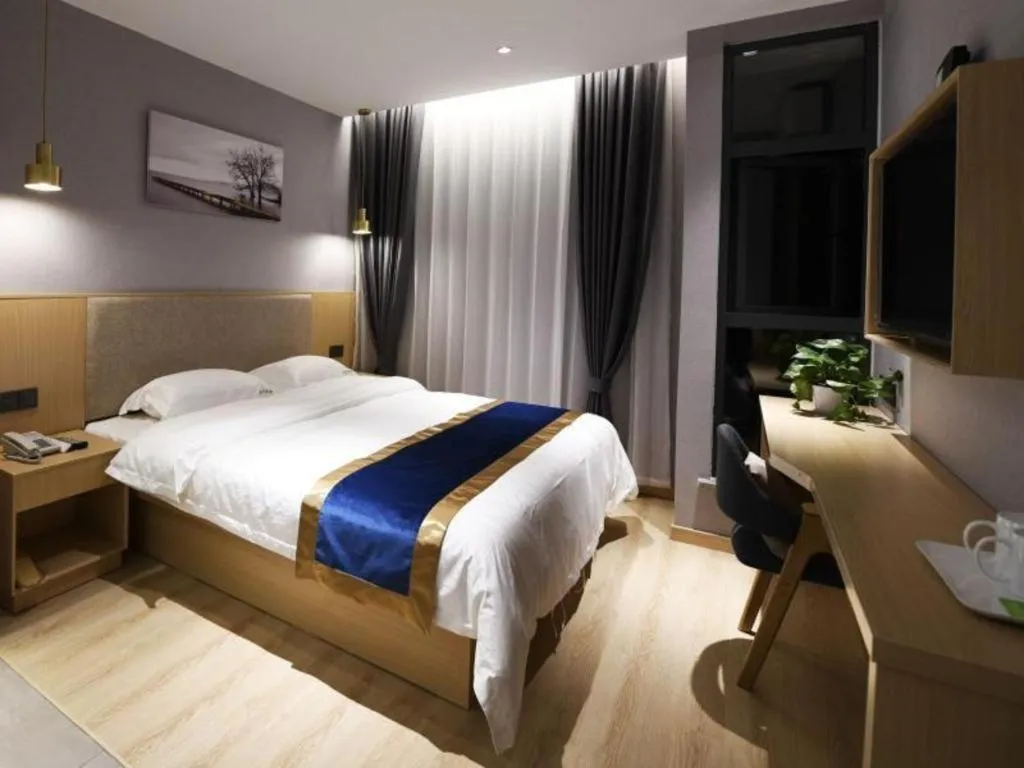 Bed in Shell Hotel Shanghai Normal University Hongcao Road Metro Station Guiping Road