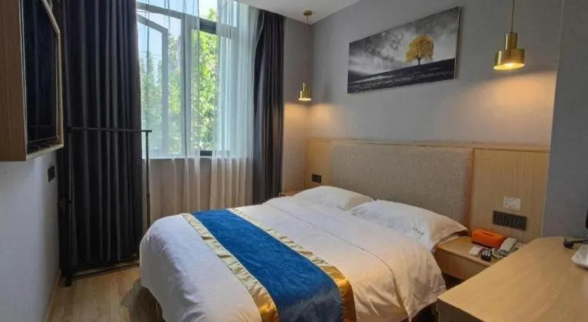 Bed in Shell Hotel Shanghai Normal University Hongcao Road Metro Station Guiping Road