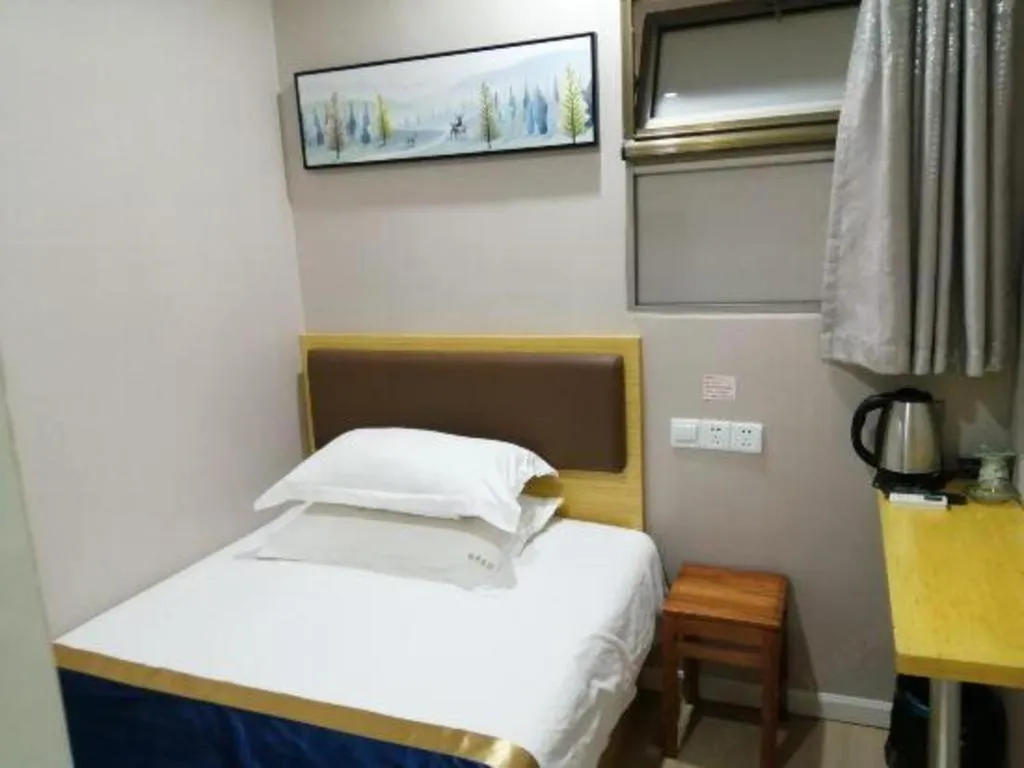Bed in Shell Hotel Shanghai Normal University Hongcao Road Metro Station Guiping Road