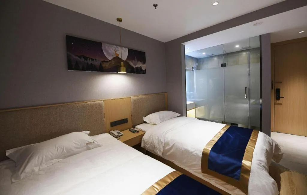 Bed in Shell Hotel Shanghai Normal University Hongcao Road Metro Station Guiping Road