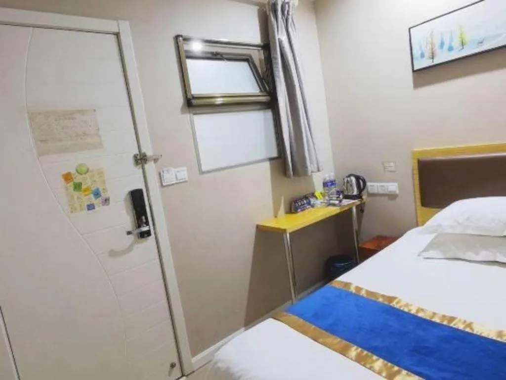 Bed in Shell Hotel Shanghai Normal University Hongcao Road Metro Station Guiping Road
