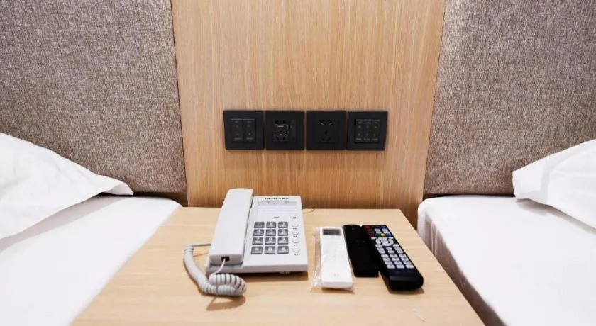 Bed in Shell Hotel Shanghai Normal University Hongcao Road Metro Station Guiping Road