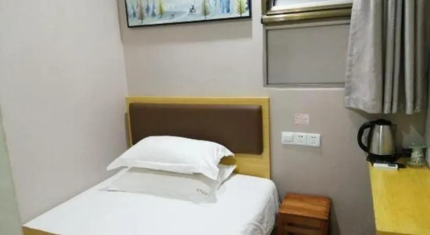 Bed in Shell Hotel Shanghai Normal University Hongcao Road Metro Station Guiping Road