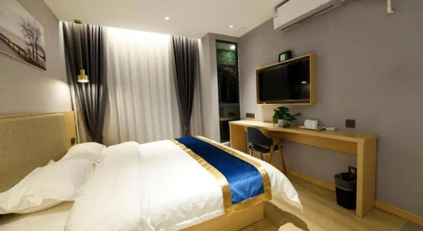 Bed in Shell Hotel Shanghai Normal University Hongcao Road Metro Station Guiping Road