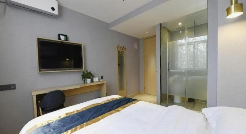 Bed in Shell Hotel Shanghai Normal University Hongcao Road Metro Station Guiping Road