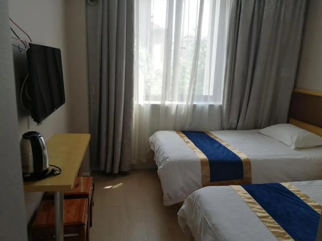 Bed in Shell Hotel Shanghai Normal University Hongcao Road Metro Station Guiping Road