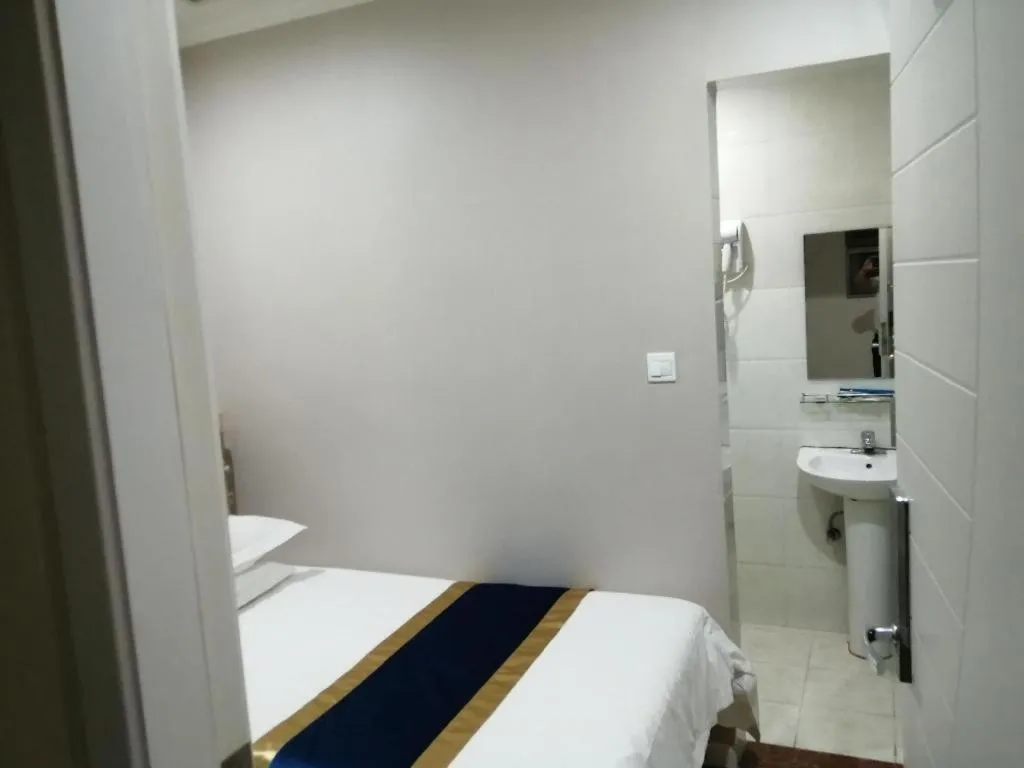 Bed in Shell Hotel Shanghai Normal University Hongcao Road Metro Station Guiping Road