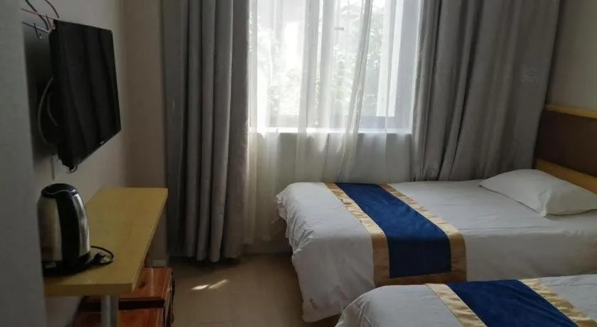 Bed in Shell Hotel Shanghai Normal University Hongcao Road Metro Station Guiping Road