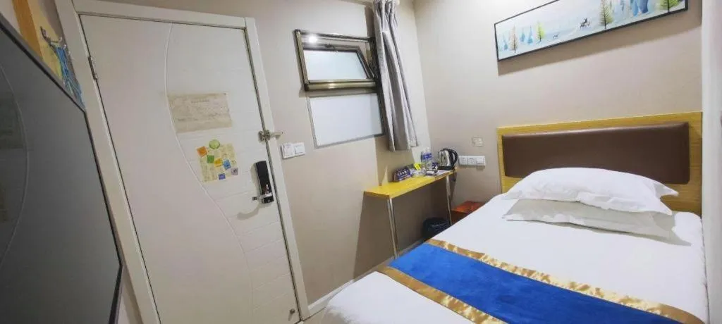 Bed in Shell Hotel Shanghai Normal University Hongcao Road Metro Station Guiping Road