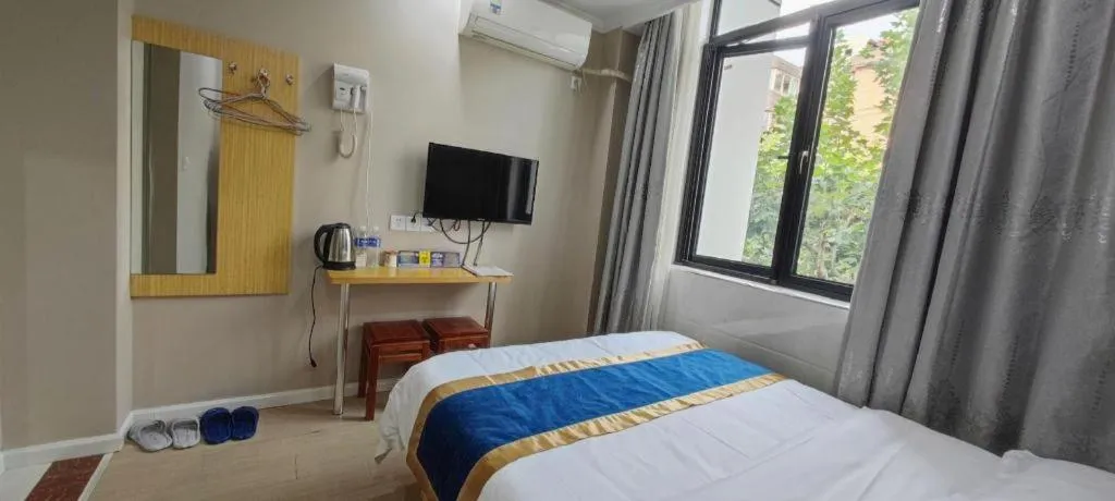 Bed in Shell Hotel Shanghai Normal University Hongcao Road Metro Station Guiping Road