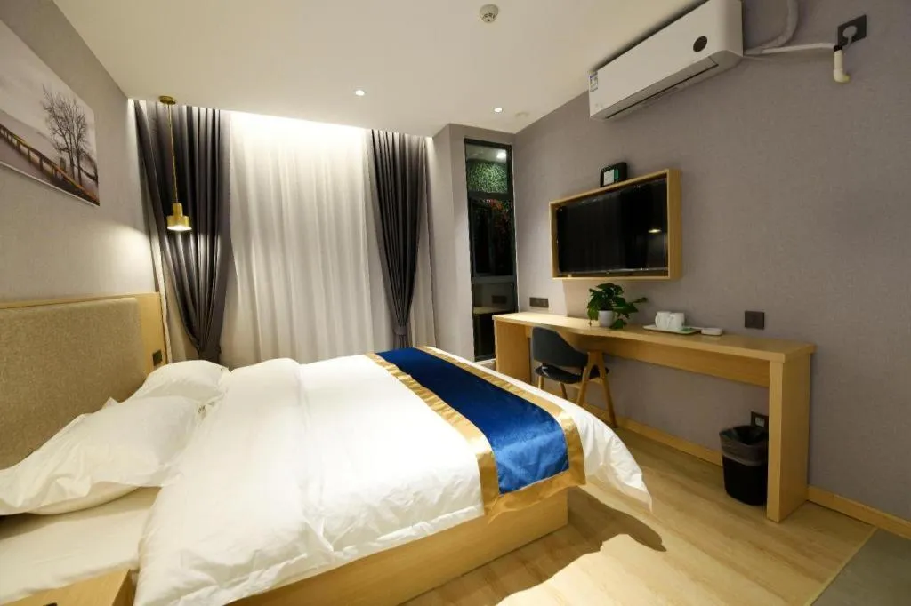 Bed in Shell Hotel Shanghai Normal University Hongcao Road Metro Station Guiping Road