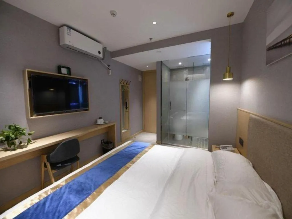 Bed in Shell Hotel Shanghai Normal University Hongcao Road Metro Station Guiping Road