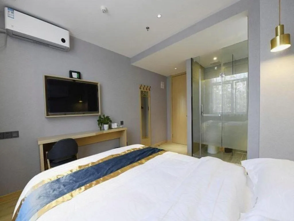 Bed in Shell Hotel Shanghai Normal University Hongcao Road Metro Station Guiping Road