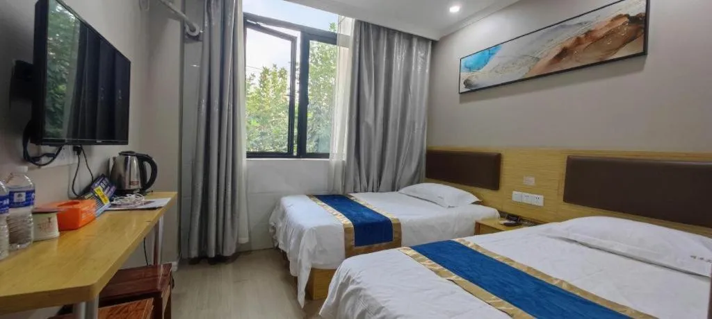 Bed in Shell Hotel Shanghai Normal University Hongcao Road Metro Station Guiping Road