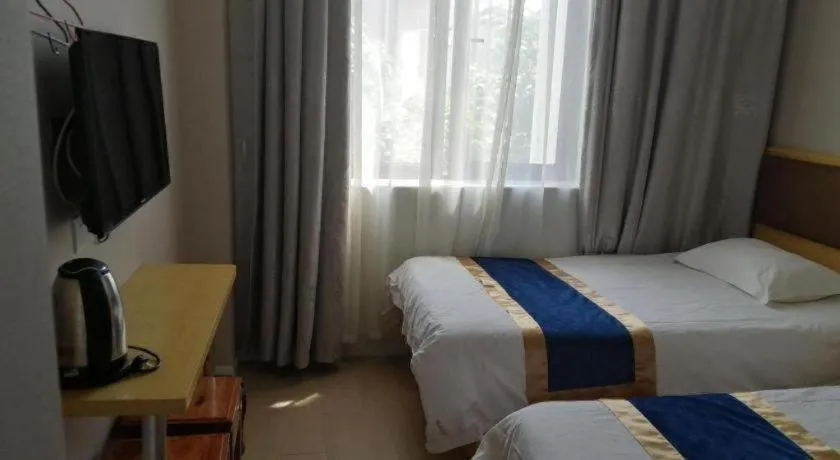 Bed in Shell Hotel Shanghai Normal University Hongcao Road Metro Station Guiping Road