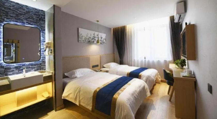 Bed in Shell Hotel Shanghai Normal University Hongcao Road Metro Station Guiping Road