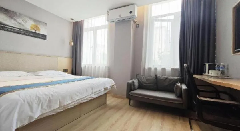 Bed in Shell Hotel Shanghai Normal University Hongcao Road Metro Station Guiping Road