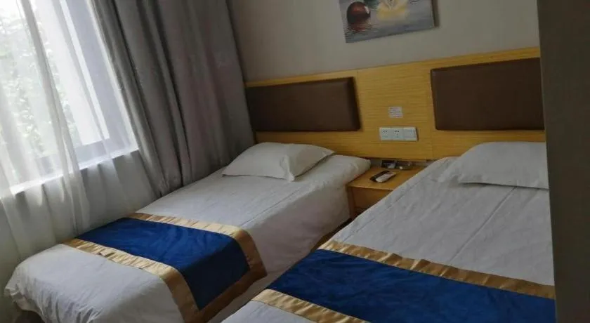 Bed in Shell Hotel Shanghai Normal University Hongcao Road Metro Station Guiping Road
