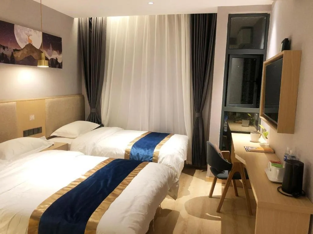 Bed in Shell Hotel Shanghai Normal University Hongcao Road Metro Station Guiping Road