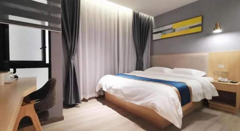 Bed in Shell Hotel Shanghai Normal University Hongcao Road Metro Station Guiping Road