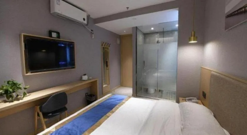 Bed in Shell Hotel Shanghai Normal University Hongcao Road Metro Station Guiping Road