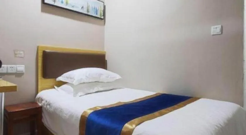 Bed in Shell Hotel Shanghai Normal University Hongcao Road Metro Station Guiping Road