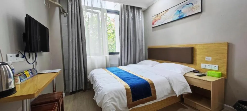 Bed in Shell Hotel Shanghai Normal University Hongcao Road Metro Station Guiping Road
