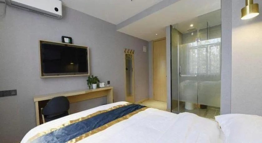 Bed in Shell Hotel Shanghai Normal University Hongcao Road Metro Station Guiping Road