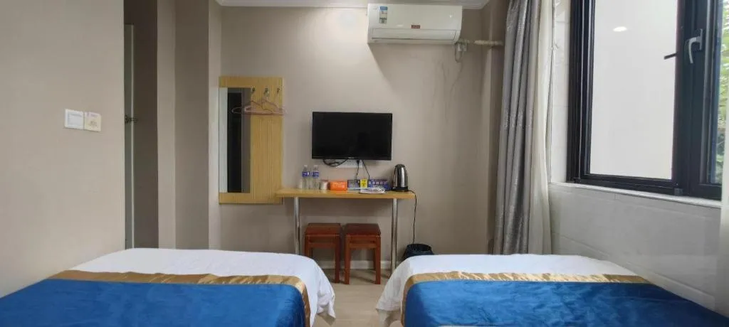 Bed in Shell Hotel Shanghai Normal University Hongcao Road Metro Station Guiping Road