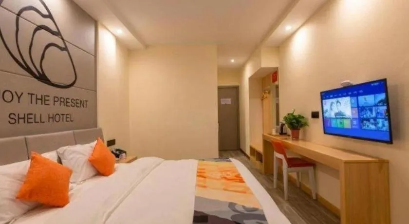 Bed in Shell Hotel Suzhou Zhangjiagang Jingang Town Central Plaza