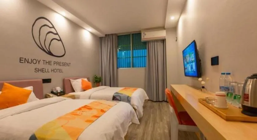 Bed in Shell Hotel Suzhou Zhangjiagang Jingang Town Central Plaza