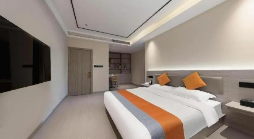 Bed in Shell Hotel Suzhou Zhangjiagang Jingang Town Central Plaza