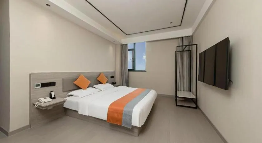 Bed in Shell Hotel Suzhou Zhangjiagang Jingang Town Central Plaza