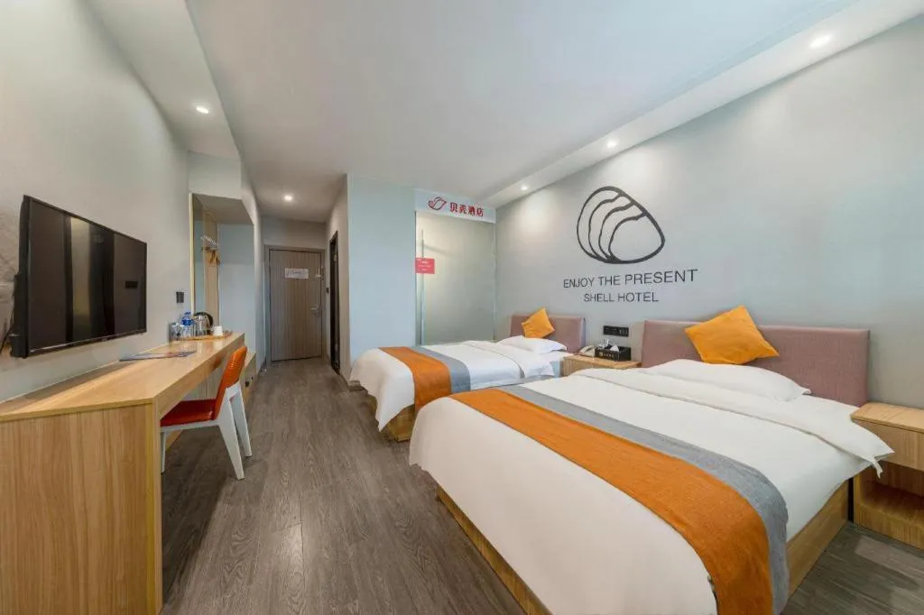 Bed in Shell Hotel Suzhou Zhangjiagang Jingang Town Central Plaza