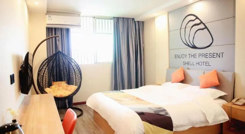 Bed in Shell Hotel Suzhou Zhangjiagang Jingang Town Central Plaza