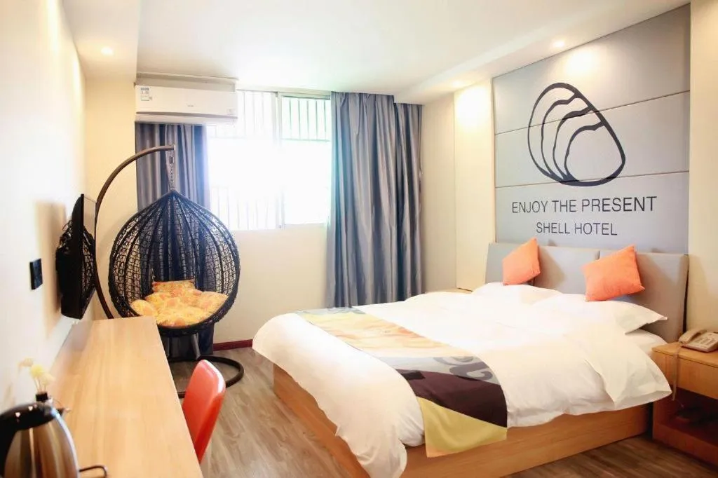Bed in Shell Hotel Suzhou Zhangjiagang Jingang Town Central Plaza