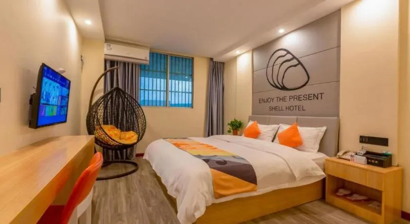Bed in Shell Hotel Suzhou Zhangjiagang Jingang Town Central Plaza