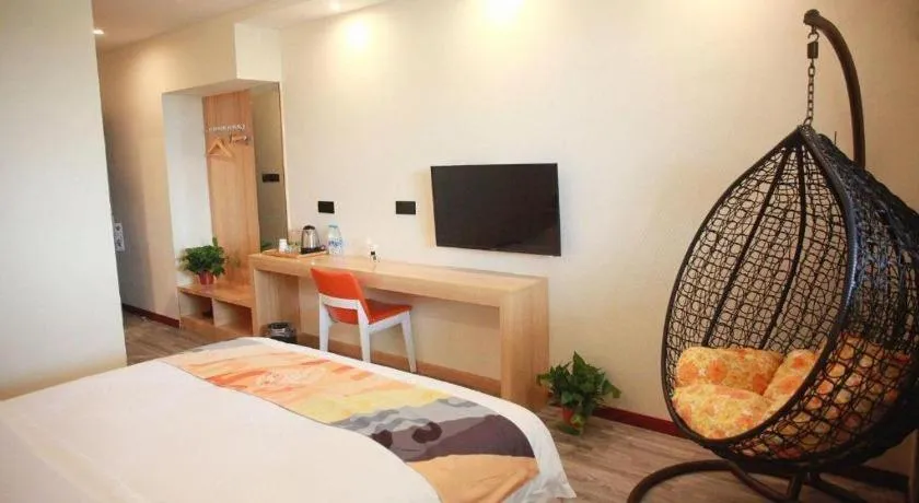 Bed in Shell Hotel Suzhou Zhangjiagang Jingang Town Central Plaza