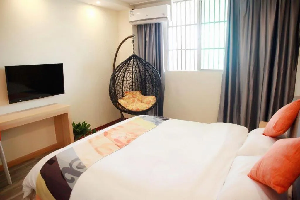 Bed in Shell Hotel Suzhou Zhangjiagang Jingang Town Central Plaza
