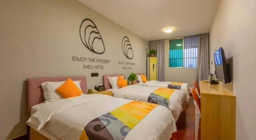 Bed in Shell Hotel Suzhou Zhangjiagang Jingang Town Central Plaza